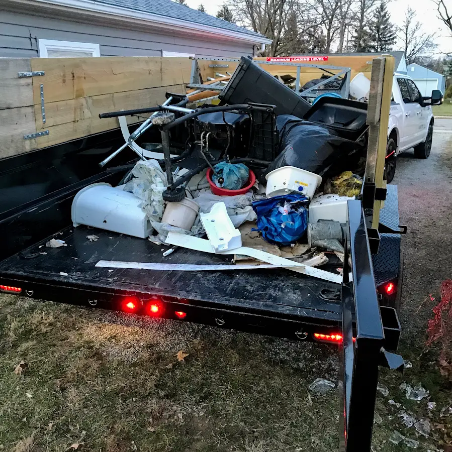Roll-off dumpster delivered to a residential driveway in Trophy Club